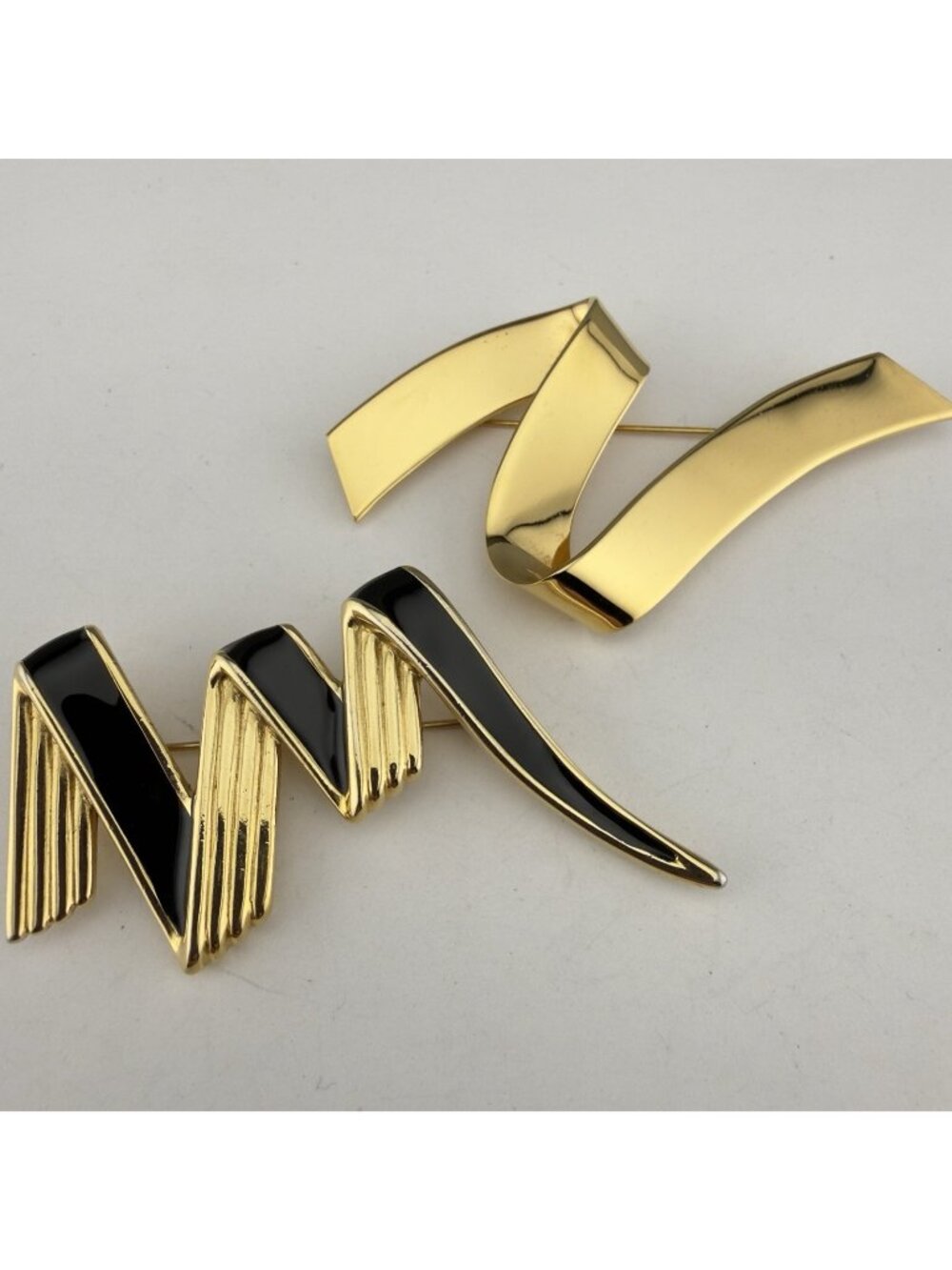 Vintage Monet Brooch Set of 2 Ribbon Zig Zag Gold Tone Black Enamel Modernist